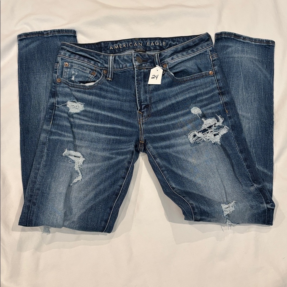 American Eagle airflex + patched skinny jeans